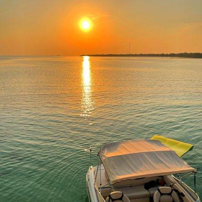 Sunset view at the end of the marina past the hotel when we took the boat out