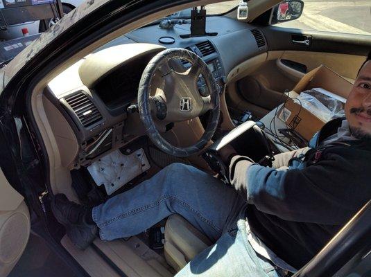 The Car Technician installing my Bluetooth module, he made it look so easy that is how you know he is a true pro!