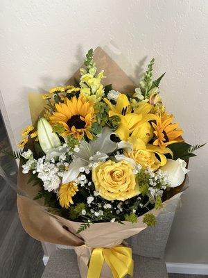 The perfect yellow and white theme bouquet. I love it. This was requested on a higher budget range. So worth it! Thanks again Lee's!