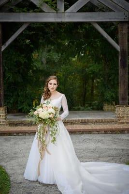 Our bride Mrs. Gilia Garland wearing her one of a kind custom gown.  photo by: Rob Mould