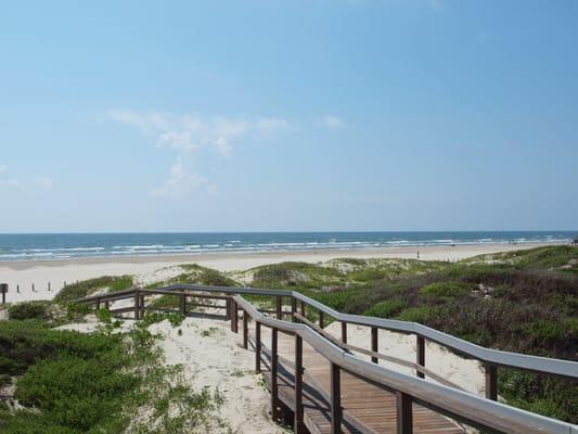 Coral Cay's boardwalk to the port a beach