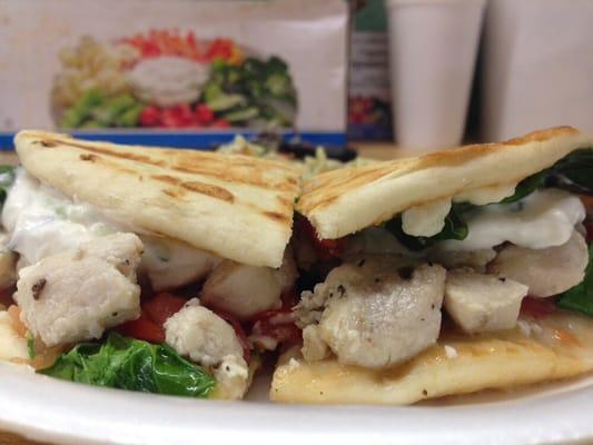 Apollo- Marinated Chicken breast, Spinach , Tomato, Feta topped with Tzadziki