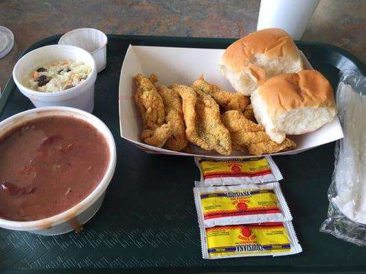 Small plate of fried fish, with coleslaw, and an extra order if a side of red beans (no rice for me)