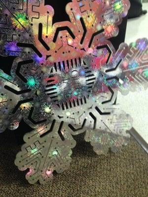 Laser cut acrylic snowflake for an event at Ohio State