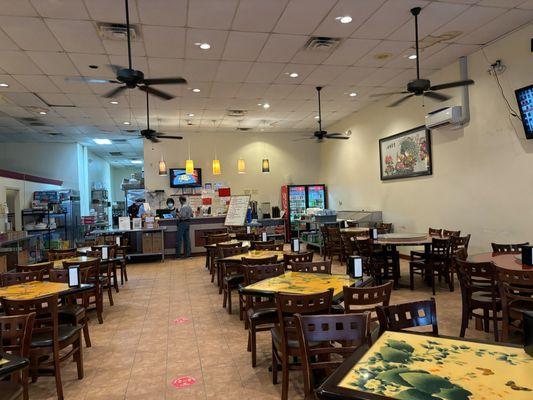 order at counter. utensil and take out box station in front of the fridge. Water and ice station beside the ordering counter