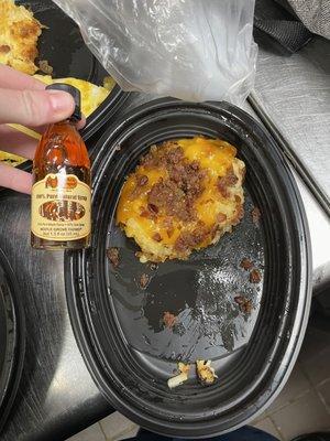 Loaded Hashbrown casserole in comparison to the bottle of syrup given