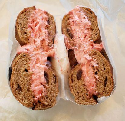 Raisin bagel with strawberry cream cheese, pre-cut into 2 halves. So good!