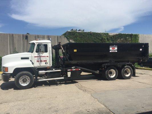 Call Disposal Services Inc. for all your Roll-Off Container needs. You're looking at our truck  with a 20yd dumpster.