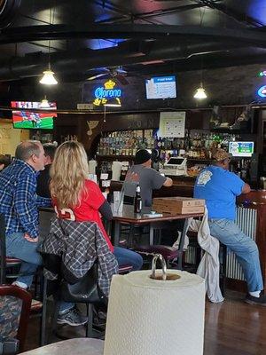 Bar and owner Brown Jerry greeting customers