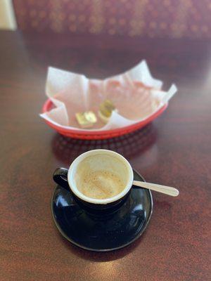 Cafe con leche with their signature Cuban bread and butter