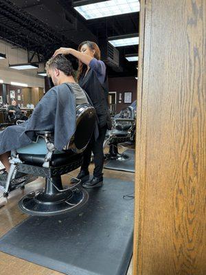 Best Barber in Town this little lady can give me the best high and tight flat top 
 Outstanding