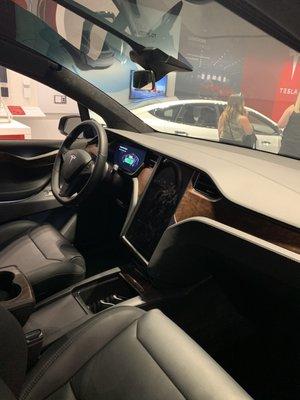 Side interior of their Model X with the right wall