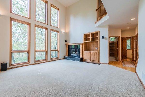 Check out this wall of windows overlooking nature in a home I sold in Medina, MN!