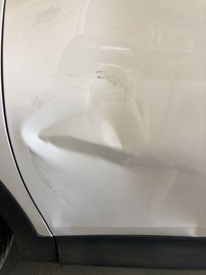 Dent and scratches in driver door