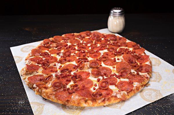 Our Triple threat pizza with three different types of pepperoni. A pepperoni lover's dream come true.