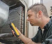 Checking a commercial air conditioning unit in Kingwood TX