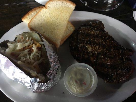 Thursday $10 ribeye. Salad, steak, baked potato, bread, all for $10! I think it was like $1 more for cheese and sour cream.