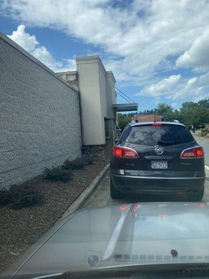 ALWAYS a long line of cars awaiting their orders...