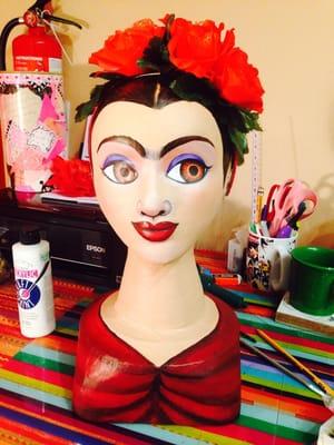 Frida Kahlo head artist Victoria de Almeida made to display hand made flower headbands she makes and sells in studio