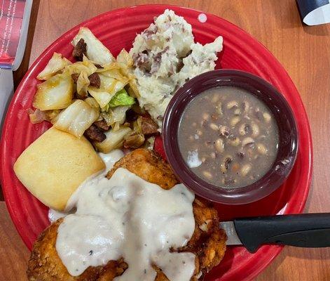 Chicken fried chicken, cabbage, smashed potatoes, purple hull peas, roll & gravy