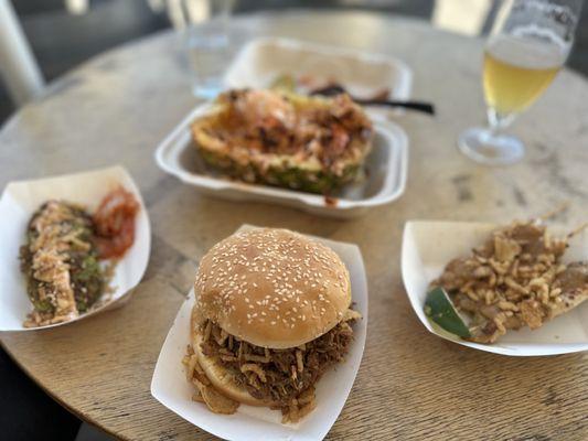 Pineapple shrimp, vegetable fritters, black pepper pull pork, chicken skewers