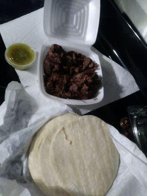 Barbacoa with fresh corn tortilla s and green salsa take out