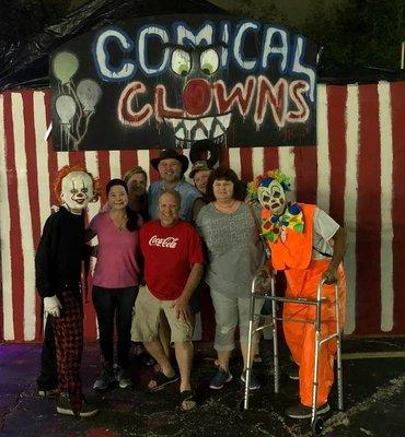 The clowns agreed to a photo after they scared us.