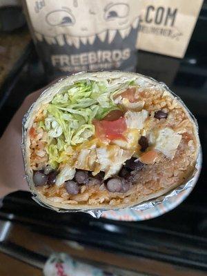 White meat chicken, Spanish rice, black beans, mixed cheese, lettuce & tomato. My classic go-to