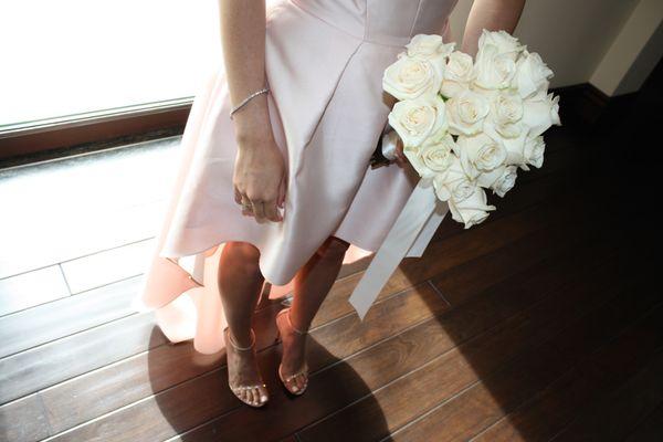 Heart-shaped rose bridal bouquet is simple yet stunning.