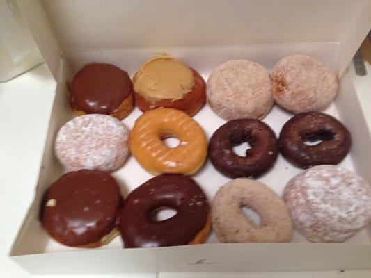 Assortment of donuts- Boston Kreme, peanut butter and jelly, chocolate, glazed, cinnamon, jelly filled, etc.