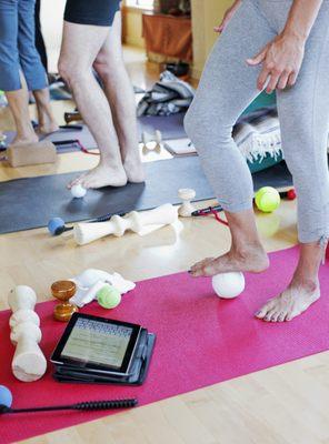 Learning how to use a variety of self-massage tools