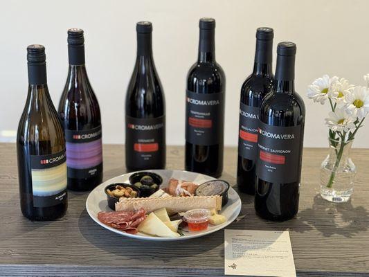 Enjoy a flight of five Spanish-style wines with a cheese and charcuterie plate