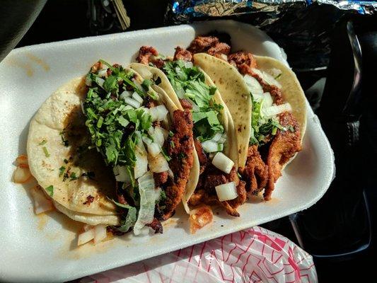 Al pastor tacos. Tasty unique blend of spiced pork very good.