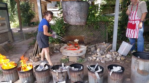 Rita took our potteries out of the Raku 'oven'