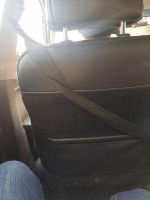 Isn't it the law to wear your seatbelt? The driver has his wrapped around the chair. He cares little about his safety or his passengers.