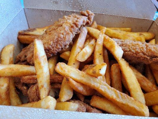 Chicken tenders with fries.