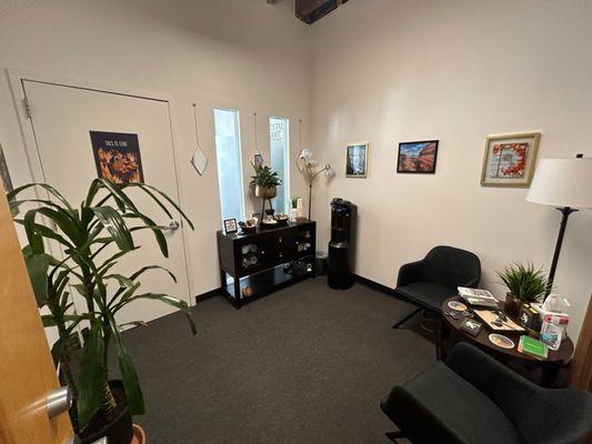 private waiting room with coffee, tea, and water on the house