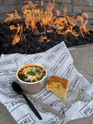 cup of chili with cornbread