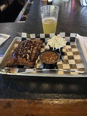 Half rack of ribs, hot baked beans, and refreshing coleslaw