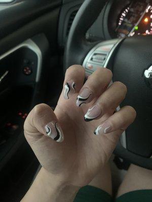 My nails look better than the photo I showed my nail lady. I LOVE these nails, recommend going to this place.