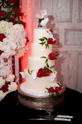 Crowning the cake with adorable Roses!