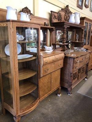 We maintain a large inventory of display, china cabinets and sideboards.