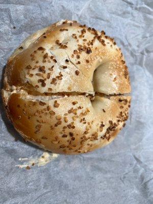 Toasted onion bagel with lox spread