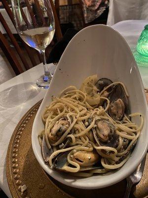 Fresh pasta with mussels in a garlic and wine sauce.