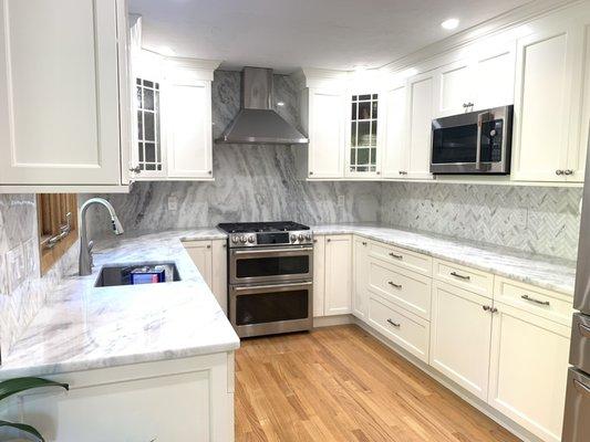 Quartzite counters and full height backsplash. Nicely done by Superior Stoneworks.