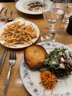 Frites, truffle risotto, and duck burger