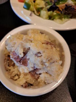 Garlic mashed potatoes with no butter or milk just a potato with garlic. Gross