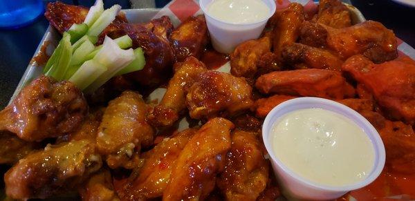 Traditional wings. From top left clockwise; BBQ, Hot, Heinie's, Sweet Chili, Parmesan Garlic.