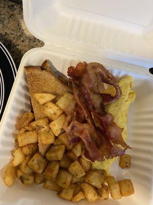 "the everyday" - bacon, scrambled eggs, breakfast potatoes and wheat toast