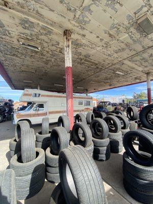 Stacks of tires in front of my sick RV